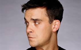 Robbie Williams isi maximizeaza look-ul cu ajutorul rinoplastiei